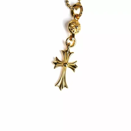 CH 22K GOLD CROSS WITH ONE GOLD BALL CHARM