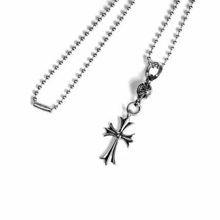 CH TINY CH CROSS WITH ONE SILVER BALL CHARM